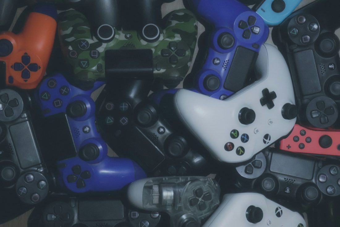 A pile of video game controllers