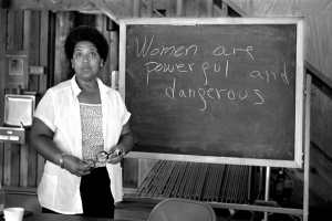 Black and white photo of Audre Lorde with the words Women are powerful and dangerous